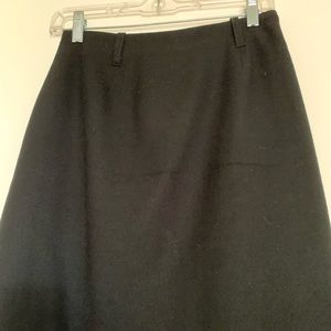 Wool skirt. Zips in back.